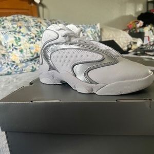 Woman’s Nike AirJordan size 6 white Metallica Silver